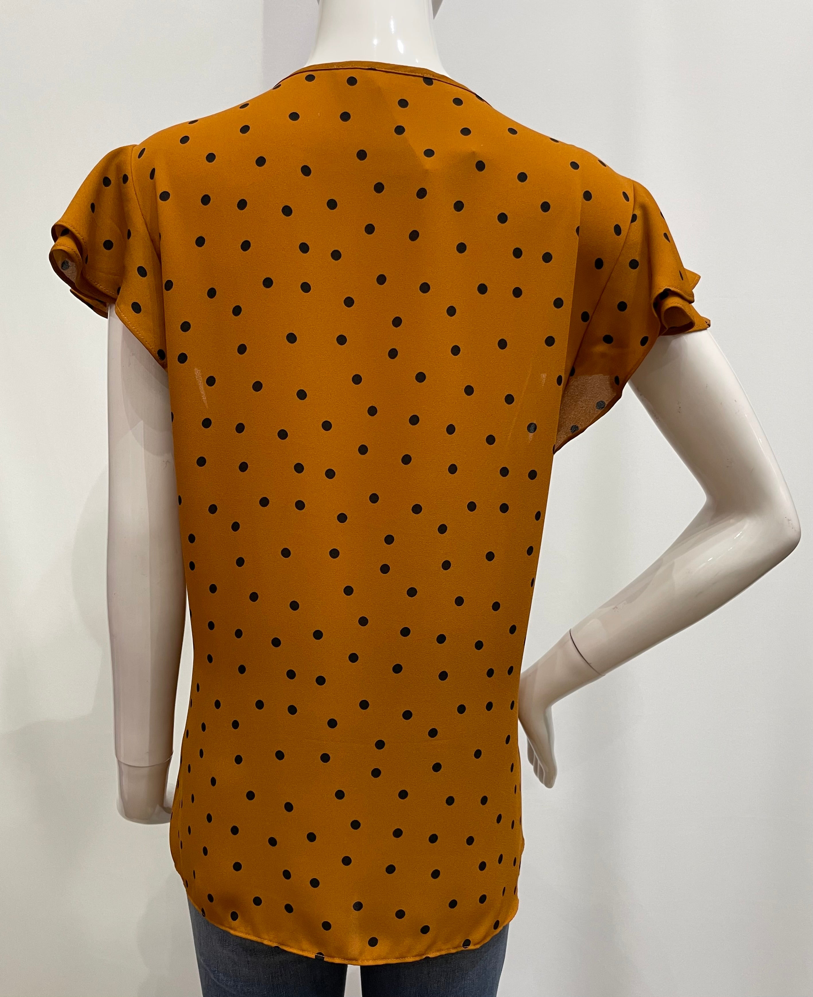 Blusa con diseño de puntos
