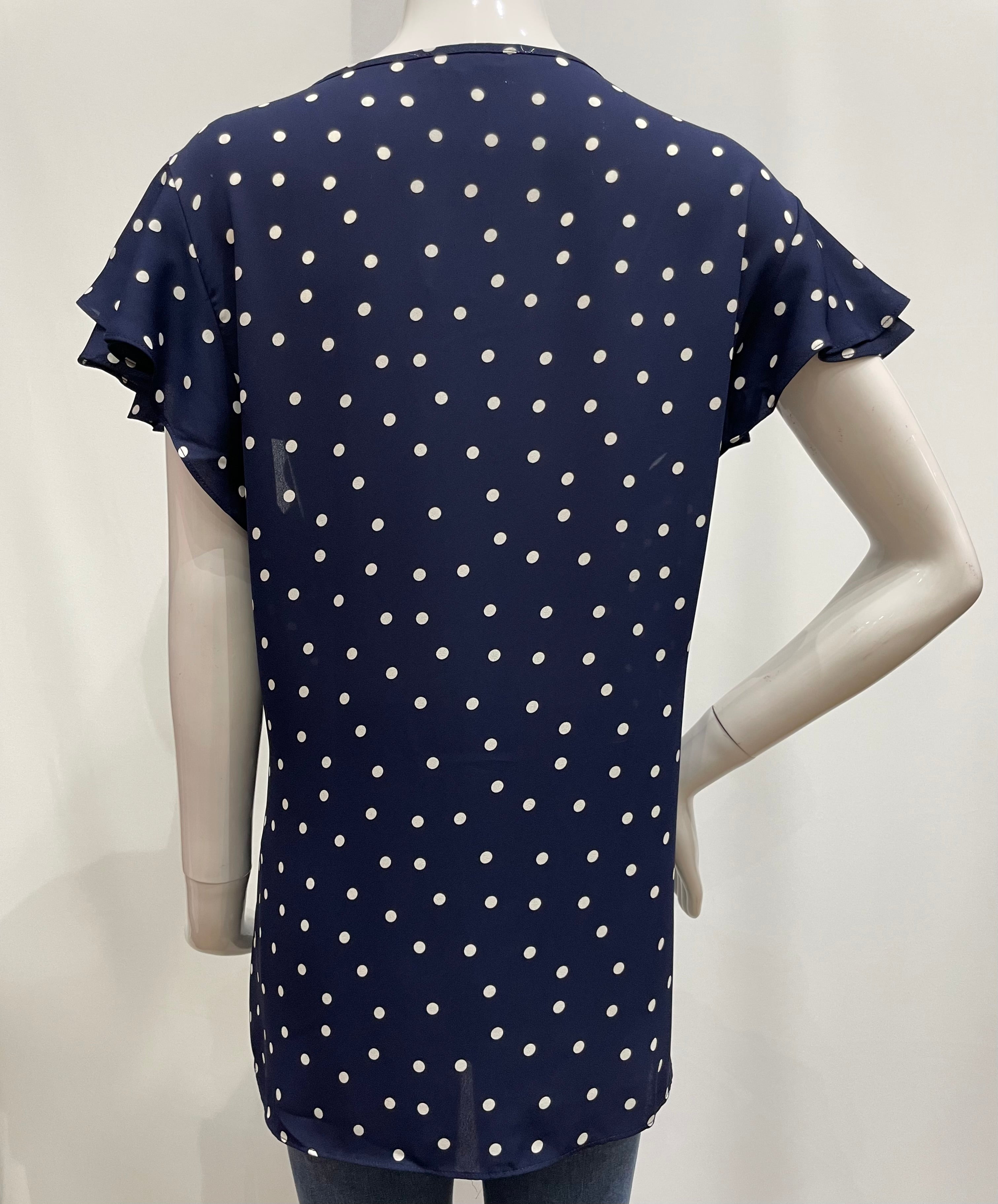 Blusa con diseño de puntos