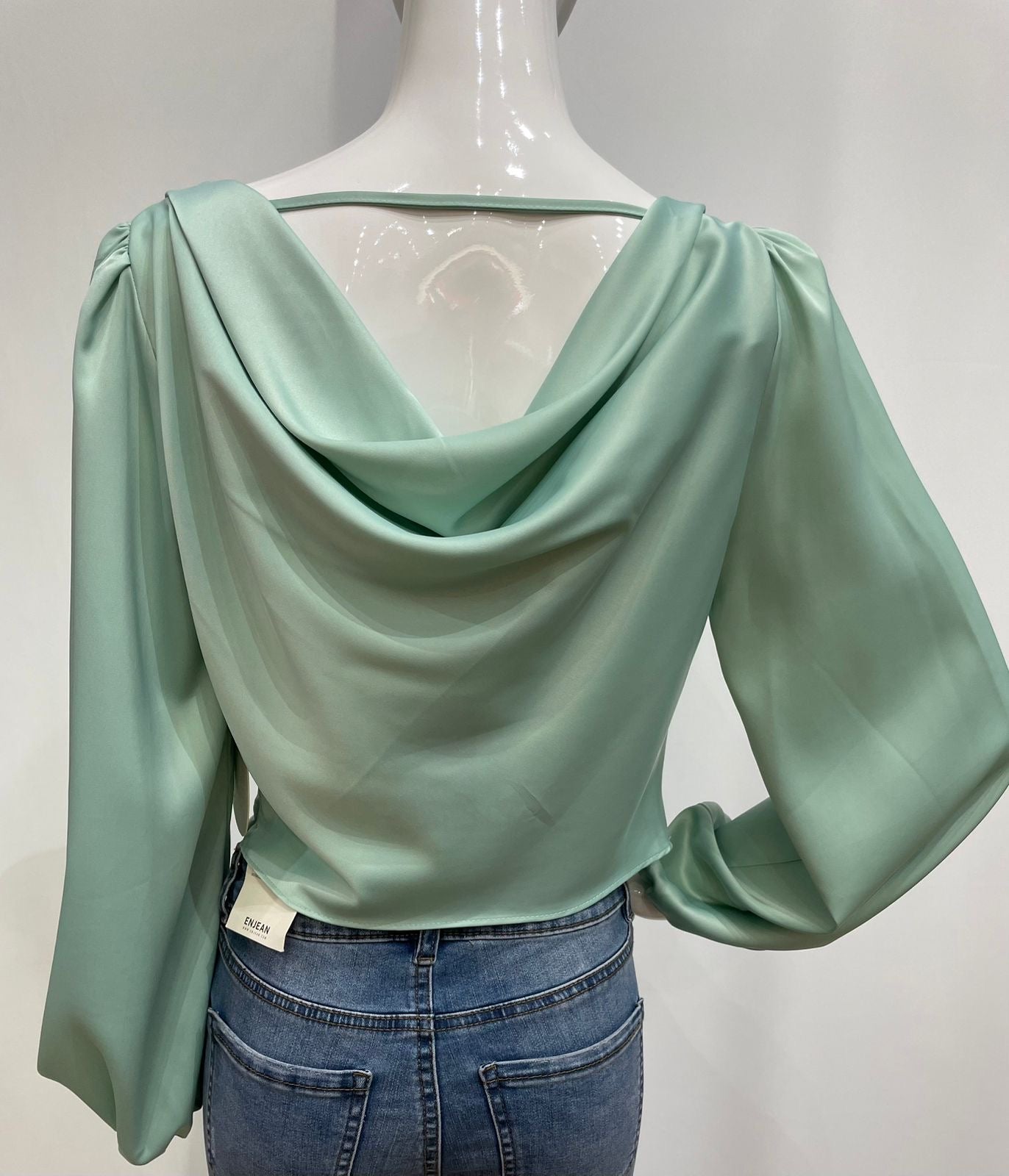 Blusa cuello drapeado