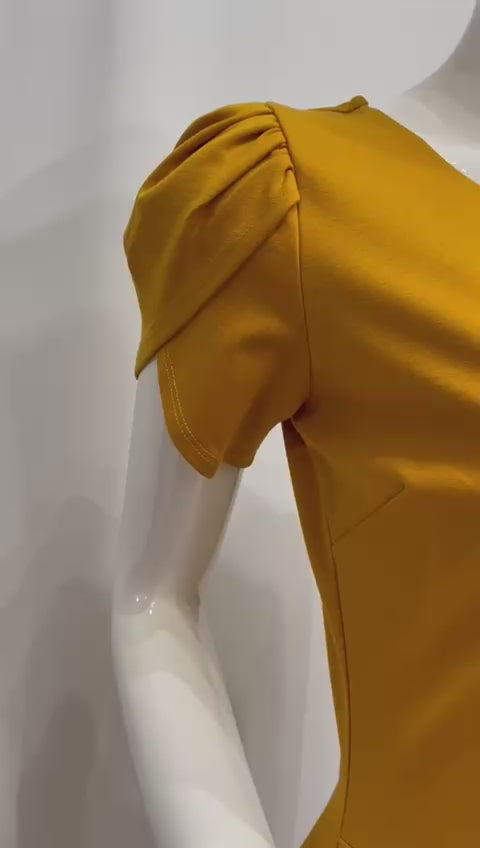 VESTIDO MOSTAZA TALLADO